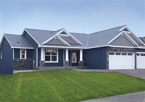 blue metal roof house|gray house with blue roof.